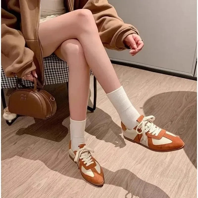 Patchwork Pointed Trainers